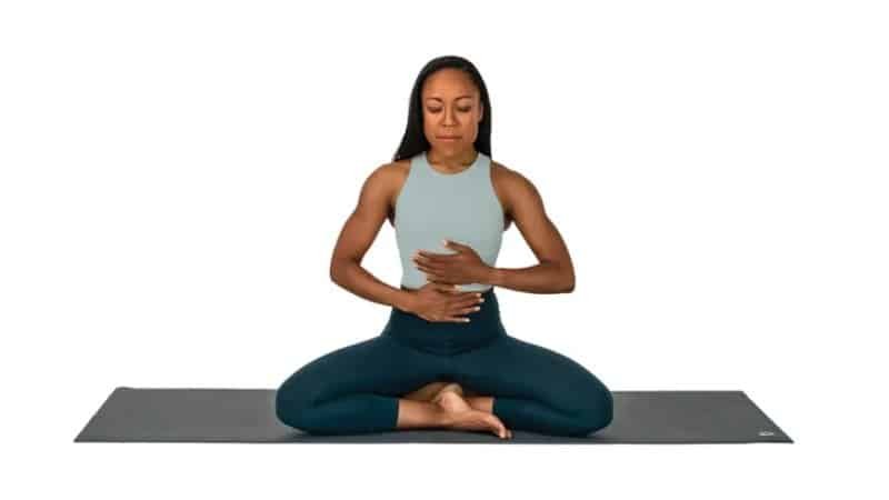 woman doing the Dirga Pranayama technique