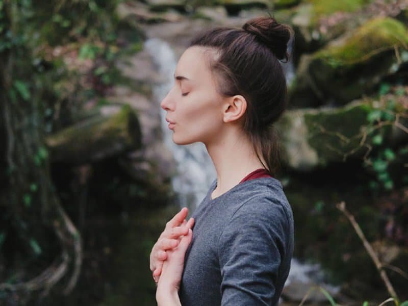 woman doing the Viloma Pranayama